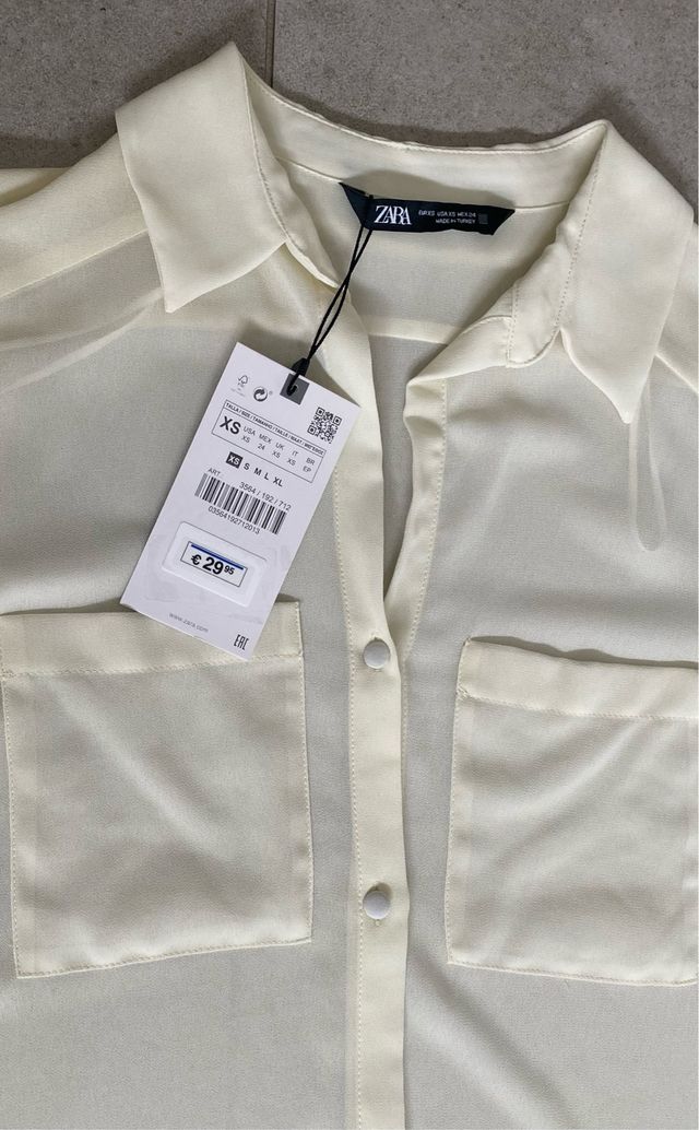 Blusa de Zara blanca semitransparente. Talla XS
