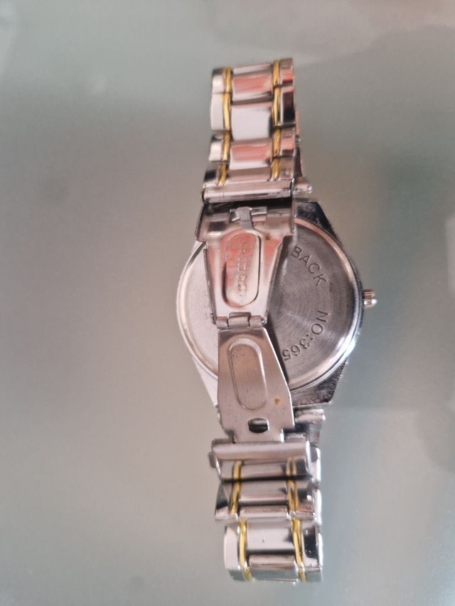 Reloj Caballero dorado y plateado