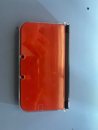 New Nintendo 3DS XL naranja y negra - Como nueva