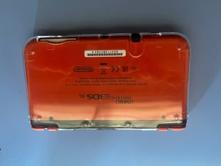 New Nintendo 3DS XL naranja y negra - Como nueva