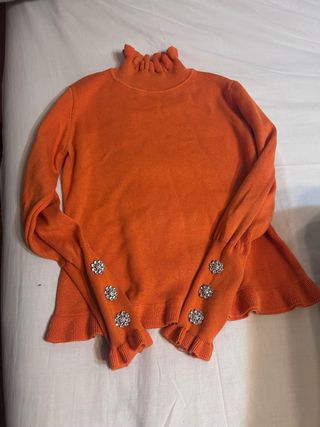 Suéter naranja cuello alto