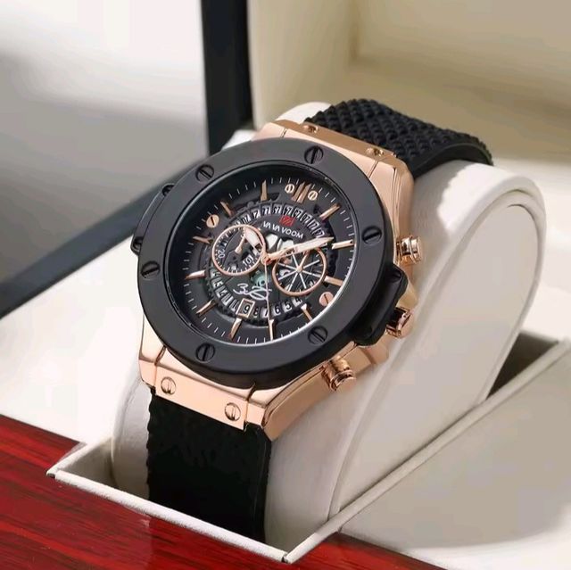 Reloj hombre negro y dorado