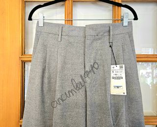 Pantalón pinzas tiro alto gris zara