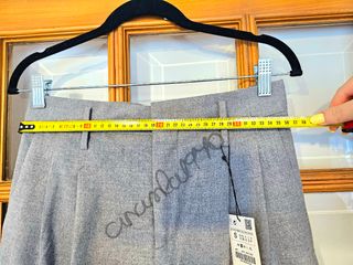 Pantalón pinzas tiro alto gris zara
