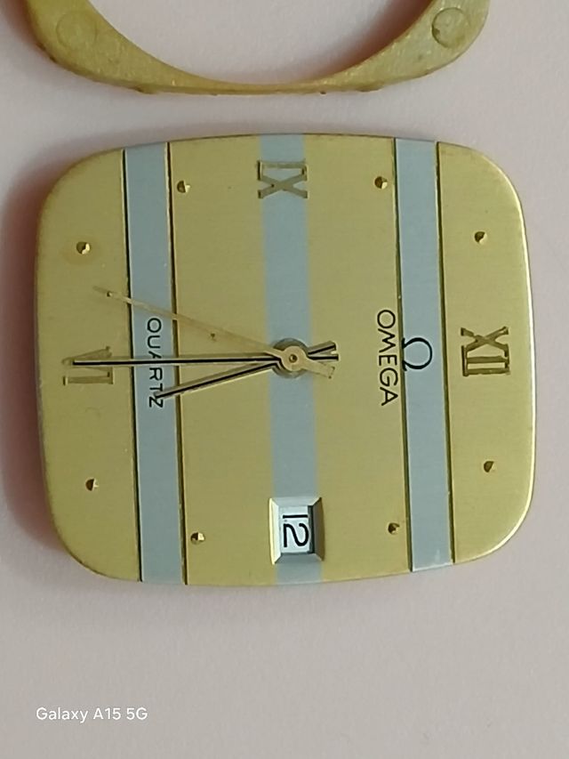 Omega: 2 relojes + maquinaria