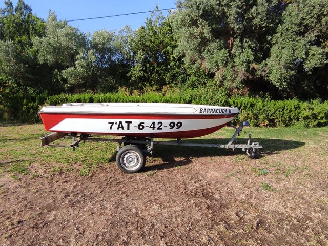 Barco con remolque .