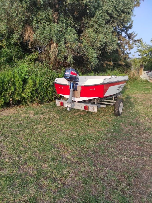 Barco con remolque .