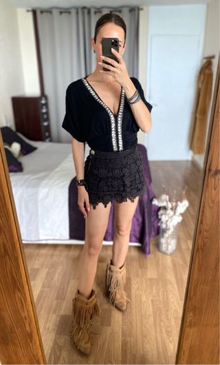 Top negro Coccapani peplum con collar pedrería XL