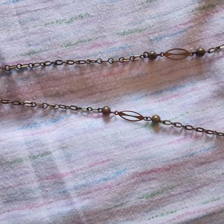 Collar con lupa antigua, indumentaria tradicional