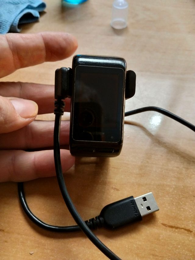 Garmin - 2 relojes negros sin encender + cargador