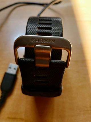 Garmin - 2 relojes negros sin encender + cargador