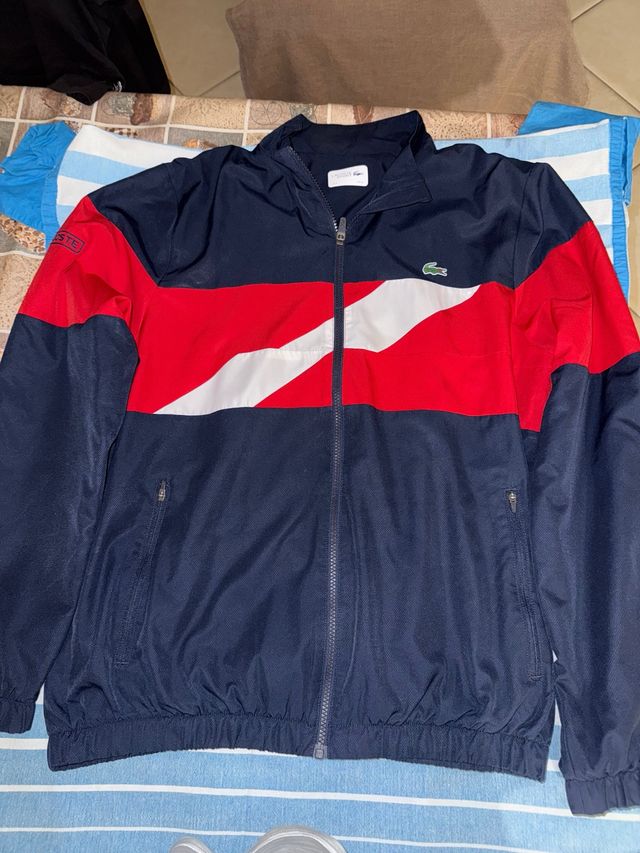 Giacca Lacoste blu e rossa