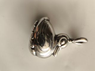 Sonajero pato baño plata años 80