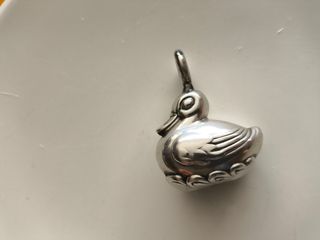 Sonajero pato baño plata años 80