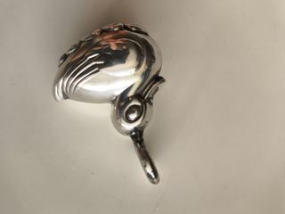 Sonajero pato baño plata años 80
