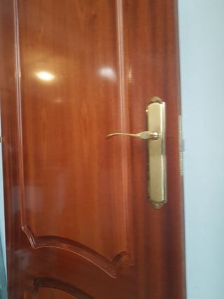 Puerta interior madera maciza dorada