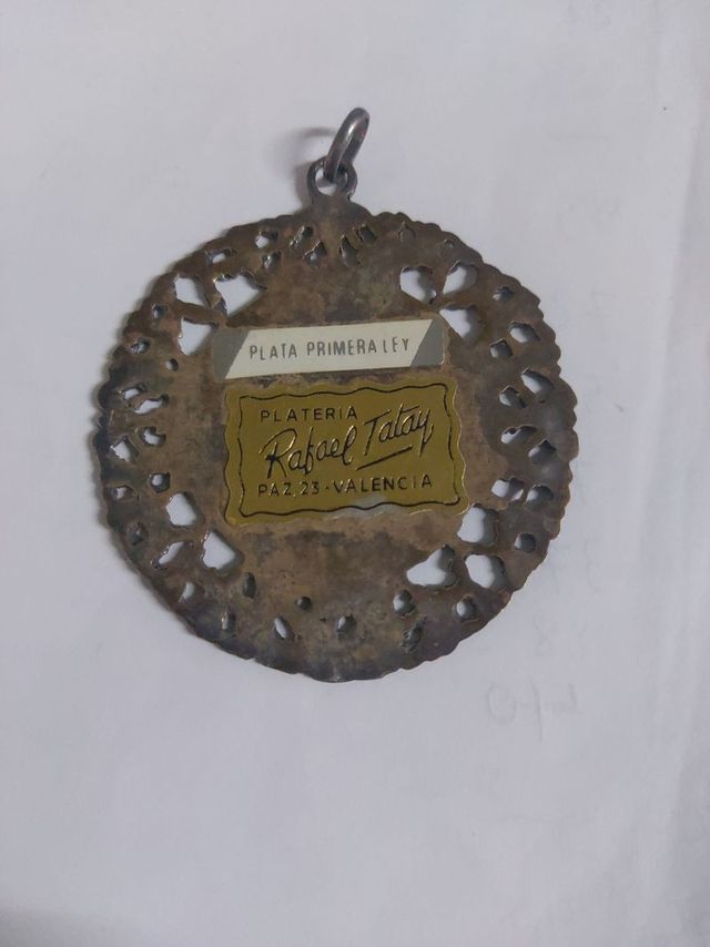 Medallón de plata