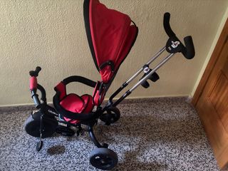 Triciclo infantil con capota rojo