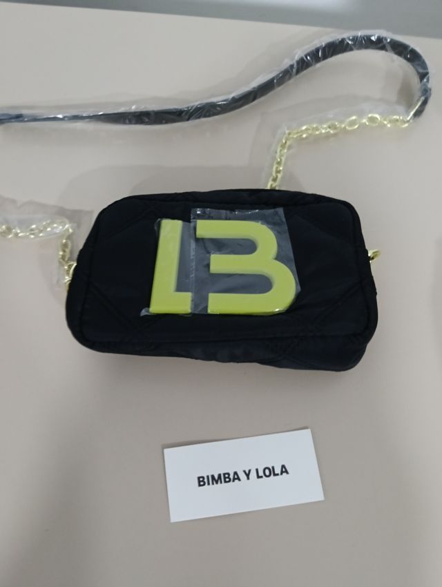 Bolso bandolera negro y amarillo