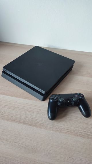 PS4 Slim 1TB negro + 1 mando negro y cables