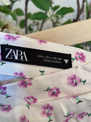 Falda midi floral morada y blanca