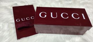 Caja y bolsa Gucci