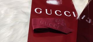 Caja y bolsa Gucci