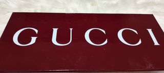 Caja y bolsa Gucci