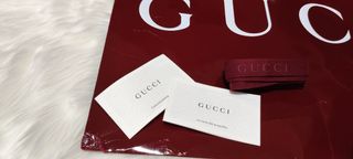 Caja y bolsa Gucci