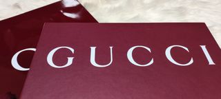 Caja y bolsa Gucci