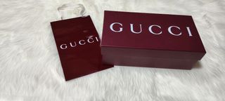 Caja y bolsa Gucci