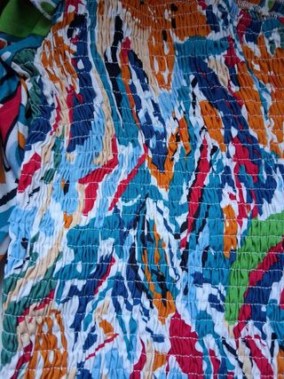 Top asimétrico multicolor