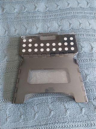 Taburete plegable negro con lunares