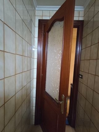 Puerta interior madera sapelly cristal