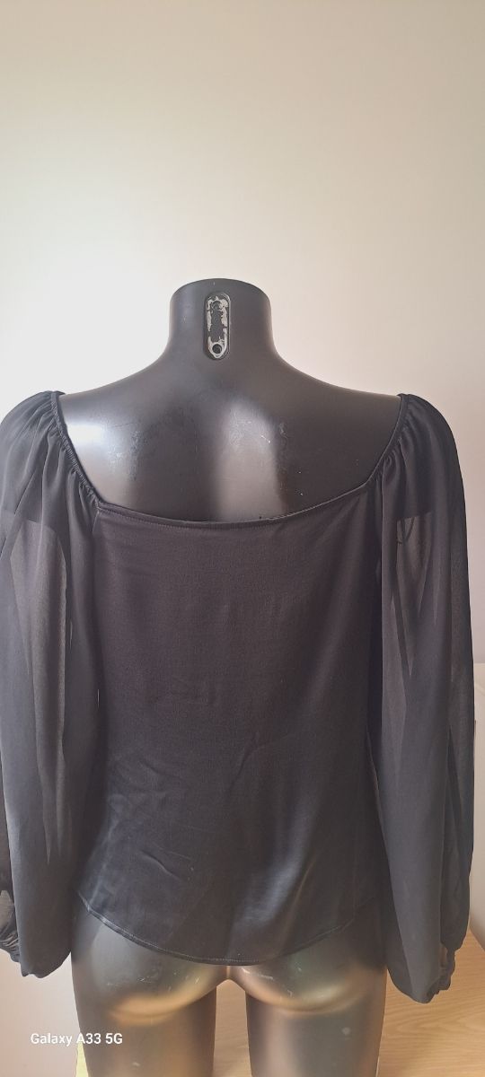 Blusa negra manga larga transparente 