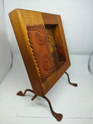 Cornice in legno e metallo stile etnico