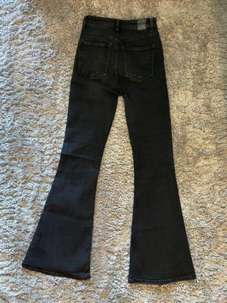 Vaqueros campana negros