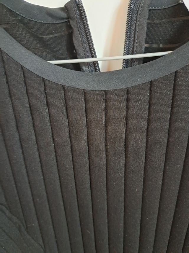 Top nero elegante a righe