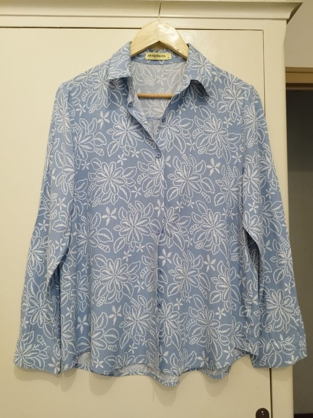 Camisa azul i blanco