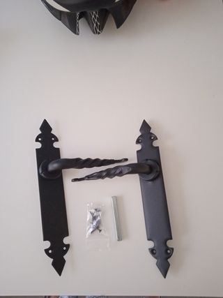 Manetas puerta hierro forja