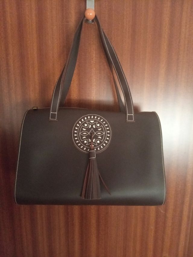 Bolso marrón piel campero.