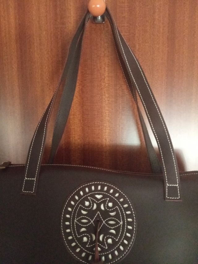 Bolso marrón piel campero.