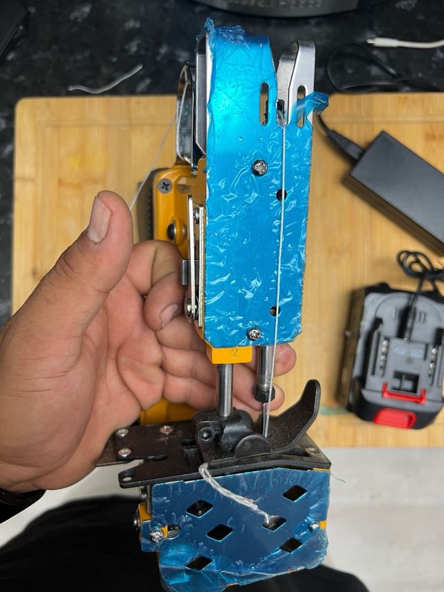 Máquina industrial de coser (portátil)