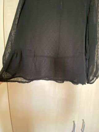 Blusa negra transparente