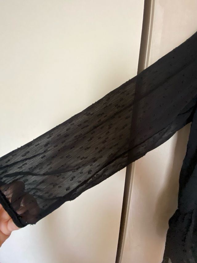 Blusa negra transparente