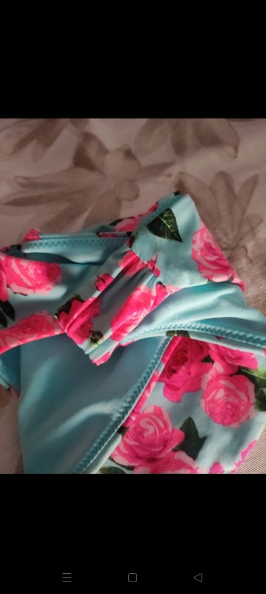 Costume H&M celeste con rose, tg M