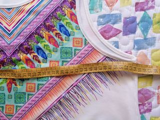 Vestido blanco étnico plumas