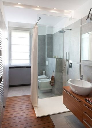 Eleva baño compacto