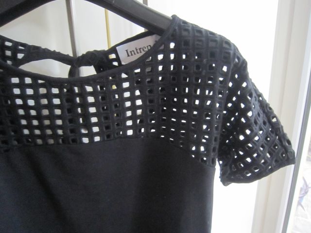 Top nero parzialmente traforato L