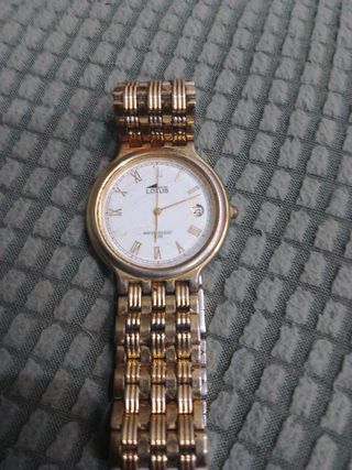 Reloj Lotus dorado
